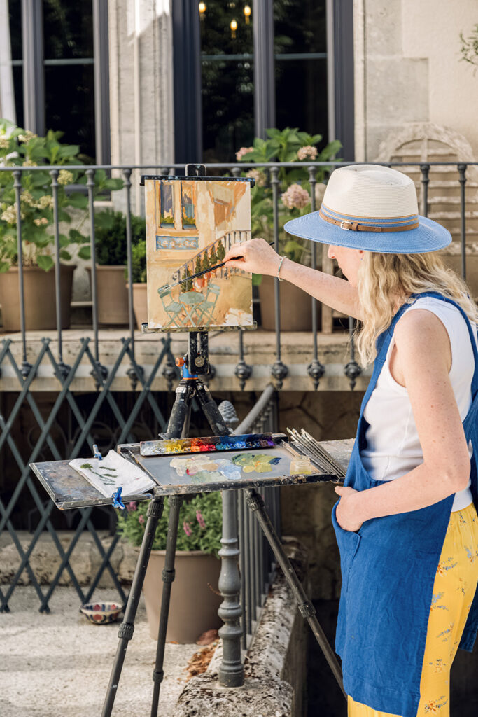 Clare Bowen painting at Chateau Charente.